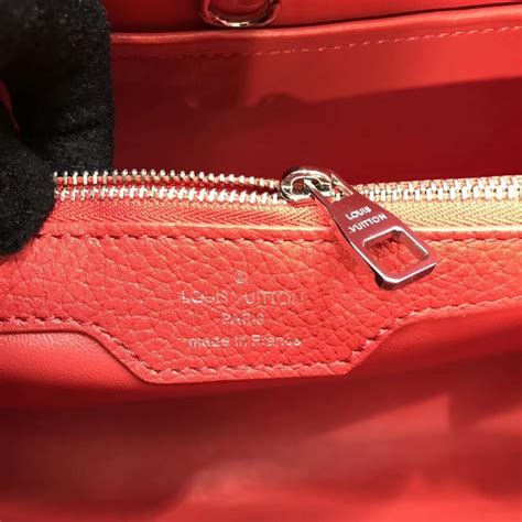 louis vuitton capucines mm m48864 fake|louis vuitton bag counterfeit.